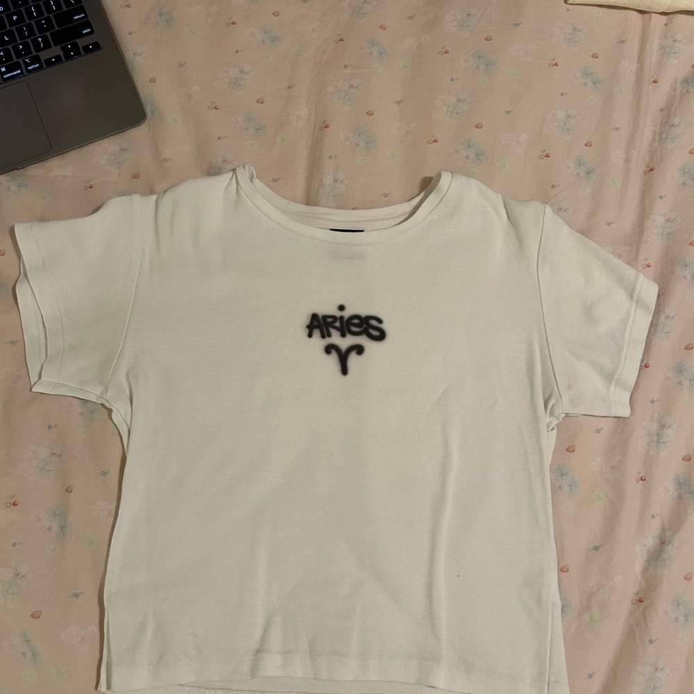 White Short Sleeve Tee with Crew Neck and Graphic Design